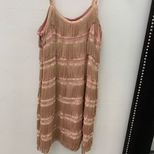 Meredith burns pink dress